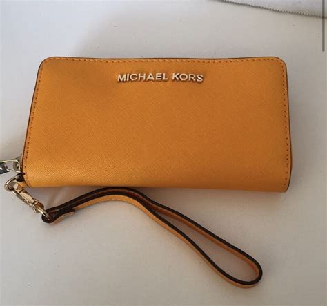 michael kors mercer leather multi function phone wristlet|MICHAEL Michael Kors Signature Mercer Large Flat Multi .